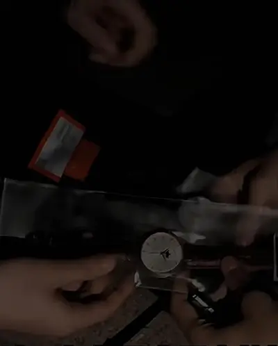 Factory runner handing over goods at night